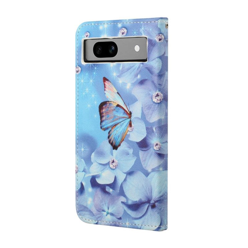 Lederhüllen Google Pixel 8a Handyhülle Blaue Blumen Und Schmetterlinge Mit Riemen