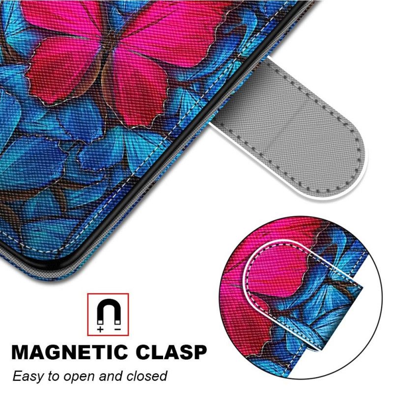 Lederhüllen Für Samsung Galaxy M23 5G Roter Schmetterling. Blauer Hintergrund