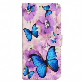 Lederhüllen iPhone 16 Pro Max Schmetterlinge Und Lila Blumen Mit Riemen