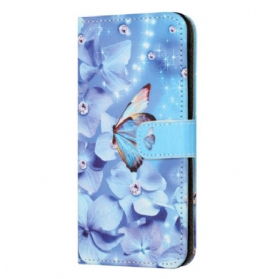 Lederhüllen Samsung Galaxy S24 Fe Blaue Blumen Und Schmetterlinge Mit Riemen