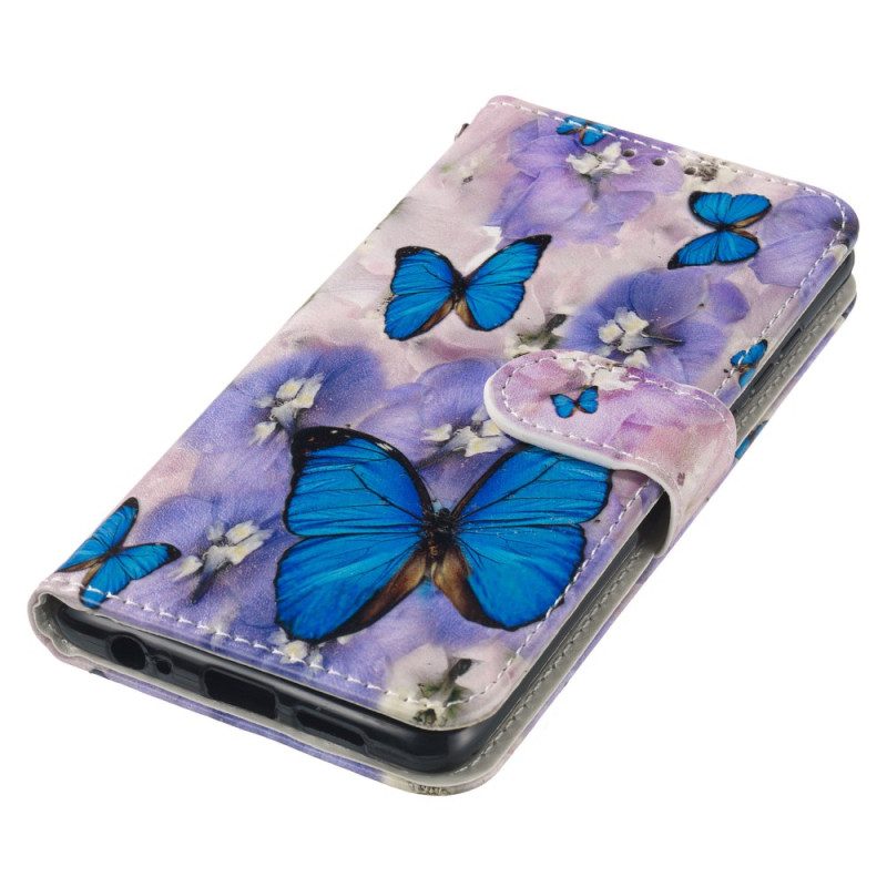 Lederhüllen Samsung Galaxy S24 Fe Handyhülle Lila Blumen Und Blaue Schmetterlinge