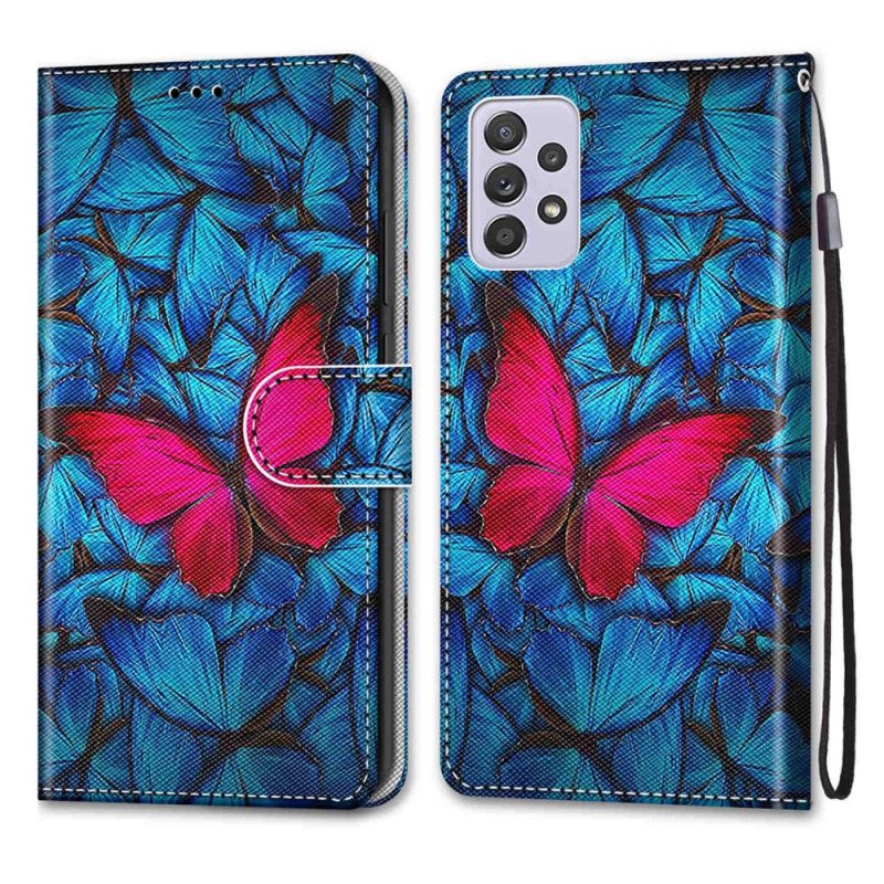 Lederhüllen Für Samsung Galaxy A33 5G Roter Schmetterling. Blauer Hintergrund