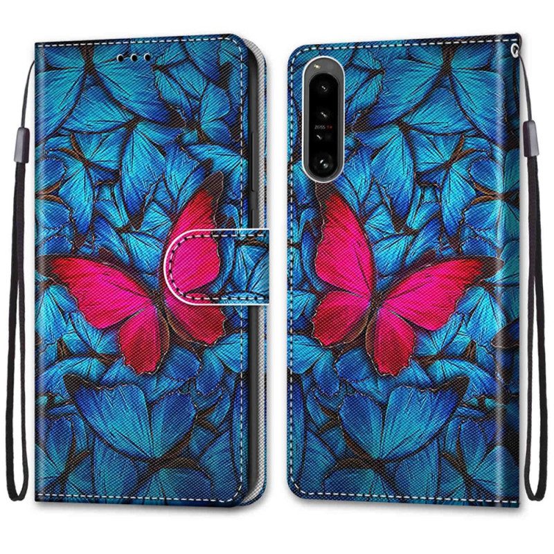 Flip Case Für Sony Xperia 1 IV Roter Schmetterling. Blauer Hintergrund