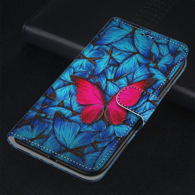 Flip Case Für Samsung Galaxy S23 Ultra 5G Roter Schmetterling. Blauer Hintergrund