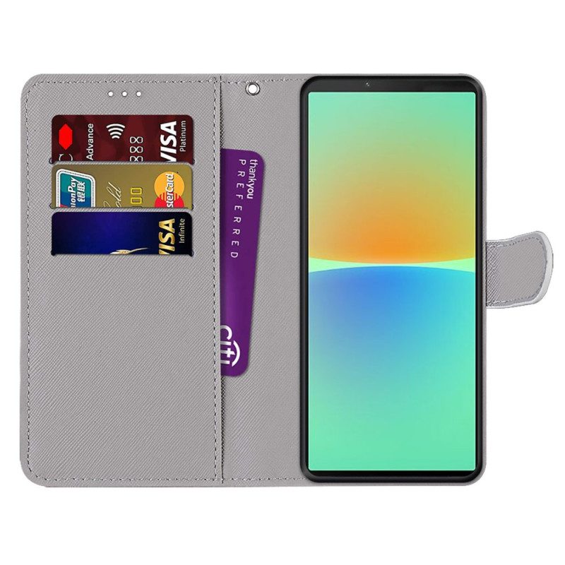 Flip Case Für Sony Xperia 10 IV Roter Schmetterling. Blauer Hintergrund