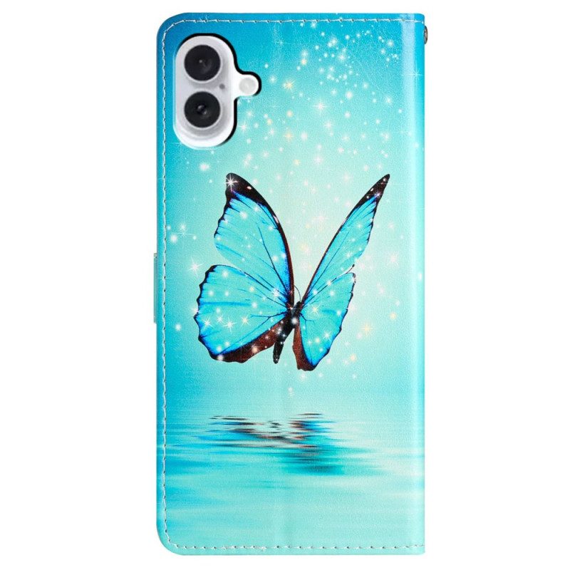 Lederhüllen iPhone 16 Handyhülle Blauer Schmetterling Mit Riemen