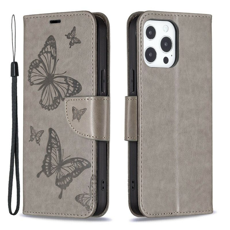 Flip Case Für iPhone 13 Pro Mit Kordel Riemchen Mit Schmetterlingen-print