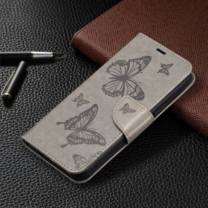 Flip Case Für iPhone 13 Pro Mit Kordel Riemchen Mit Schmetterlingen-print